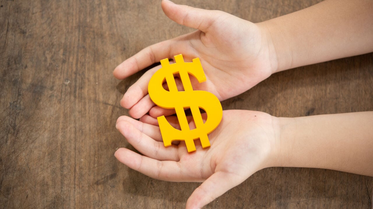 The Yellow Dollar Symbol On Hands Children The Yellow Dollar Symbol On Hands Children