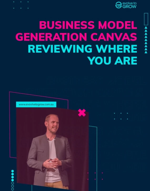 a man standing in front of a screen with the words business model generation canvass