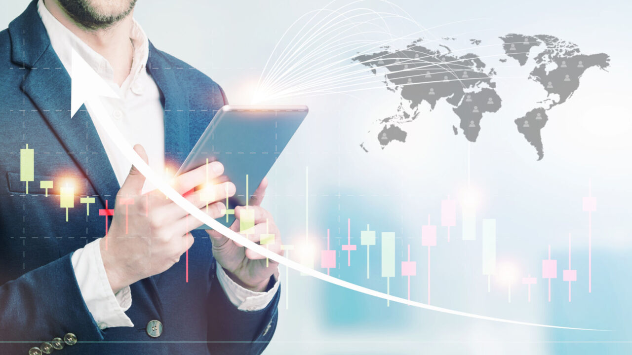 Double Exposure Of Businessman Using The Tablet With Cityscape And Financial Graph On Blurred Building Background, Business Trading Concept double exposure of businessman using the tablet with cityscape and financial graph on blurred building background, business trading concept