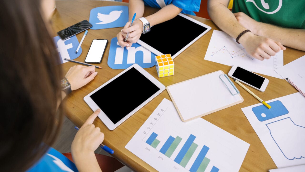 Overhead View Skillful People Using Digital Tablet Workplace overhead view skillful people using digital tablet workplace